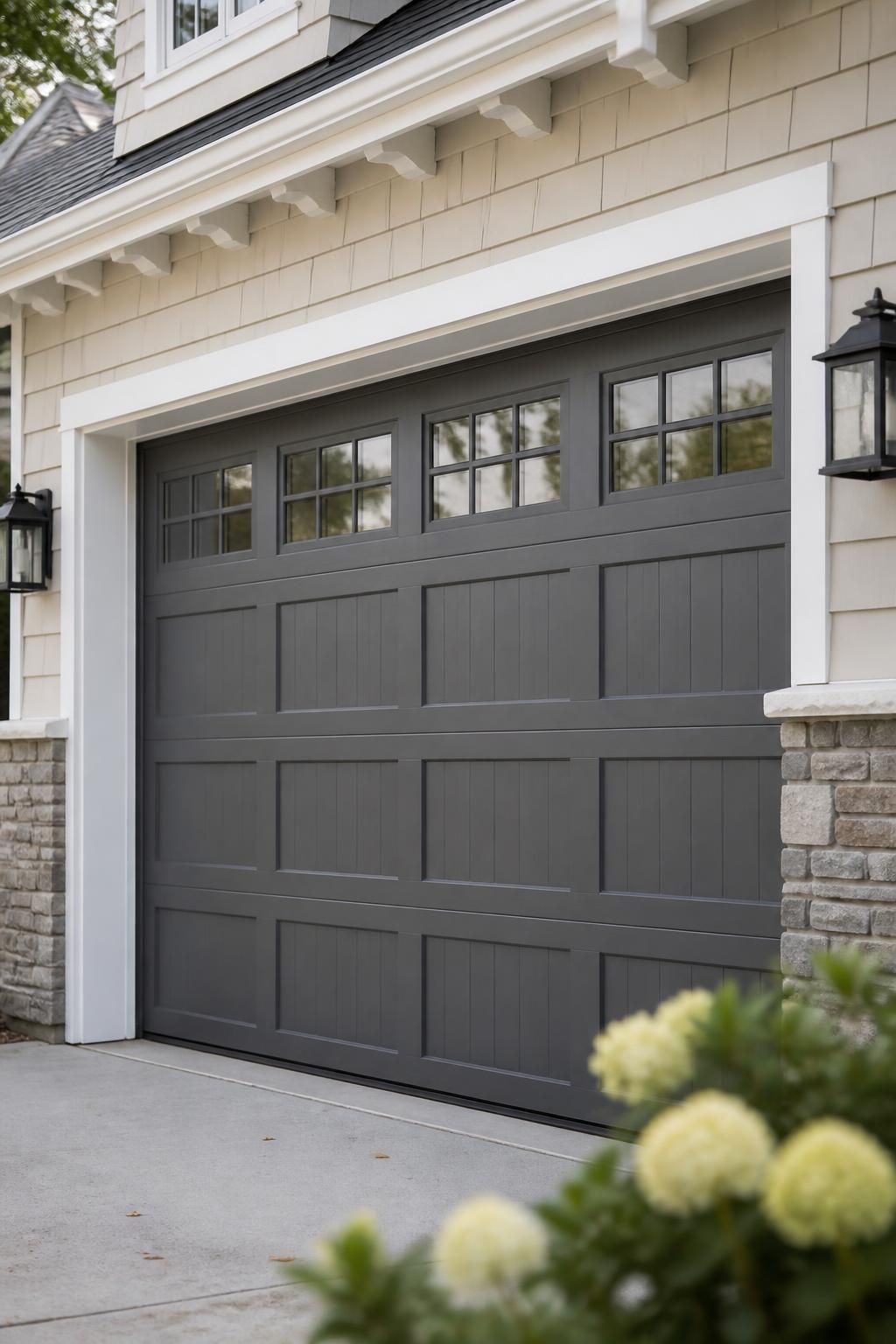 Finished garage door installation with crisp panel alignment and clean trim